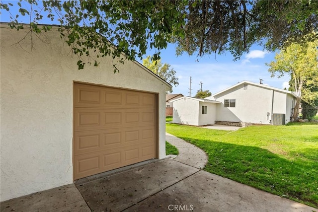 garage with a lawn