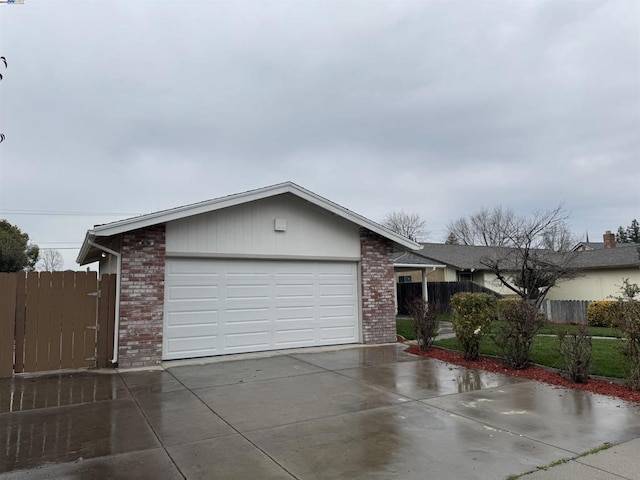 ranch-style home featuring a garage