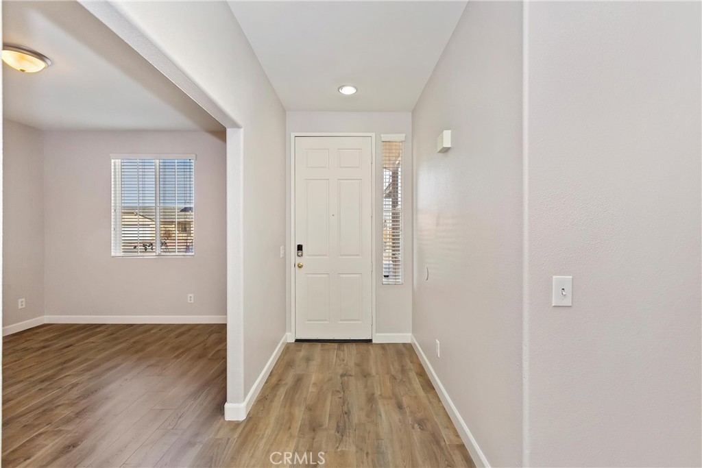 foyer with light wood-type flooring