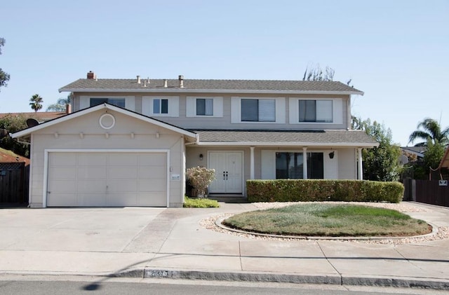 front facade with a garage