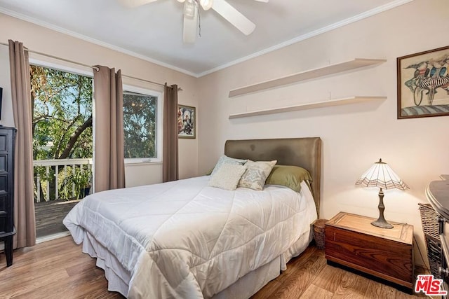 bedroom with crown molding, ceiling fan, and light wood-type flooring