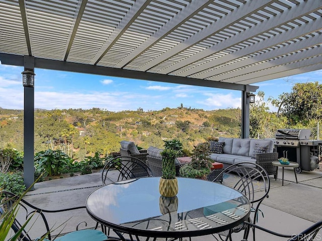 view of patio / terrace featuring an outdoor living space, grilling area, and a pergola