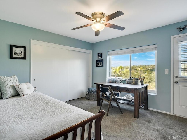 bedroom featuring carpet, ceiling fan, and a closet