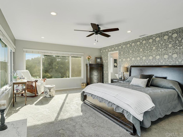 carpeted bedroom featuring ceiling fan