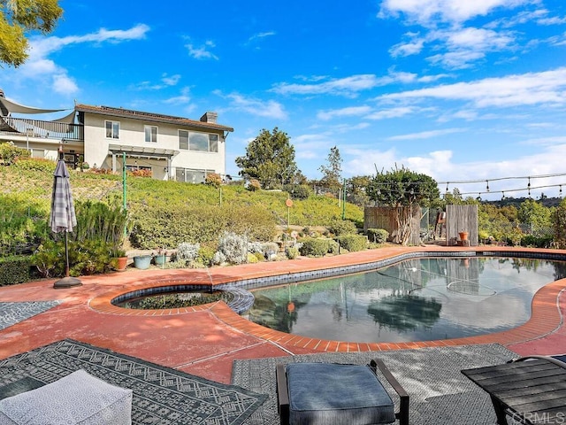 view of pool with a patio