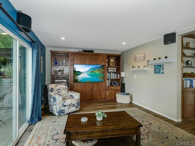 living room featuring dark hardwood / wood-style floors