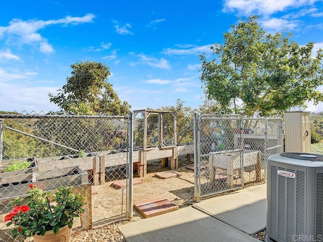 view of patio with cooling unit