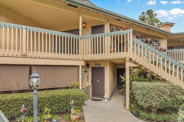 doorway to property featuring a balcony