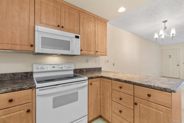 kitchen featuring hanging light fixtures, white appliances, a notable chandelier, kitchen peninsula, and a textured ceiling