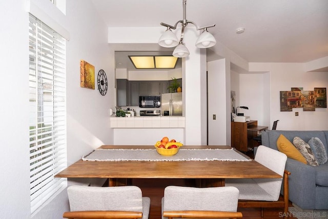 dining room featuring a chandelier