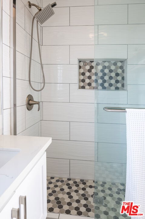 bathroom featuring vanity and a shower with curtain