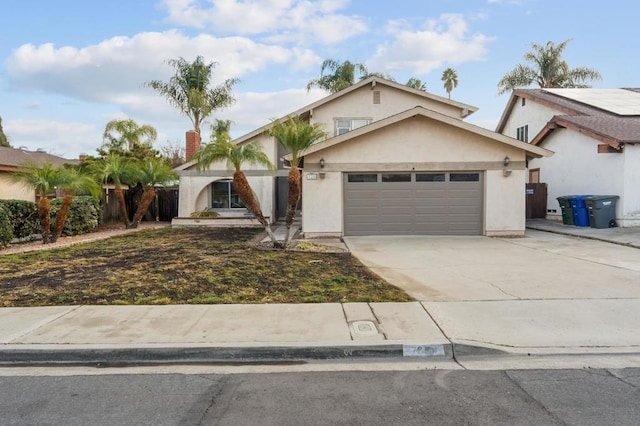 front of property with a garage