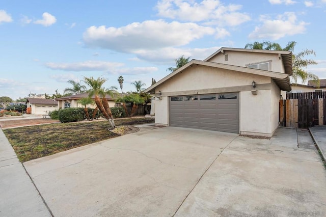 ranch-style house featuring a garage