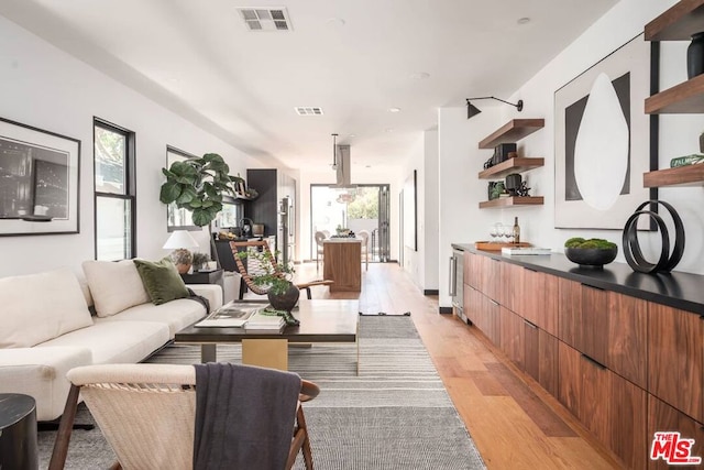 living room with light wood-type flooring