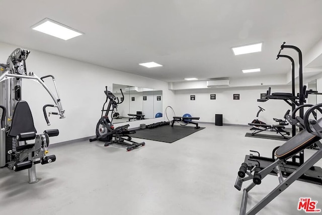 gym with a wall mounted AC