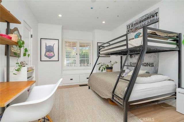 bedroom featuring light wood-type flooring