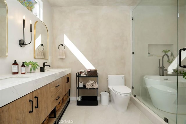 bathroom featuring vanity, an enclosed shower, and toilet