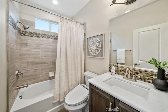 full bathroom with vanity, shower / bath combination with curtain, backsplash, and toilet