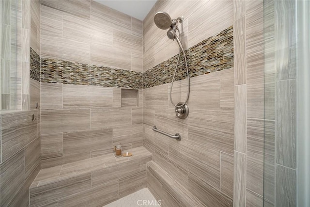 bathroom featuring tiled shower