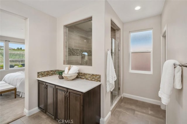 bathroom featuring tile patterned flooring and walk in shower