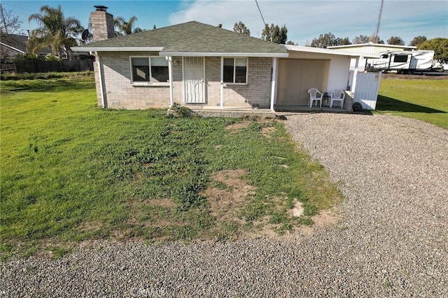 view of front of property with a front lawn