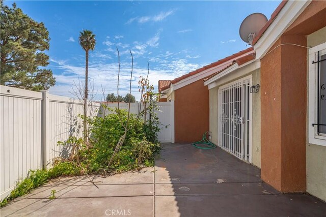 3738 Harrison St Unit 31, Riverside, CA 92503 - view of patio featuring fence