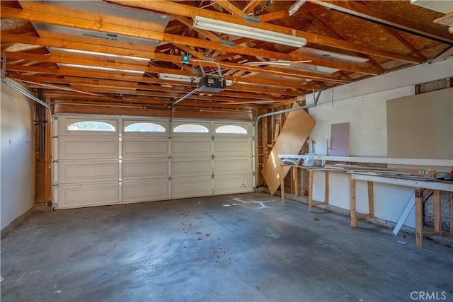 3738 Harrison St Unit 31, Riverside, CA 92503 - garage featuring a garage door opener