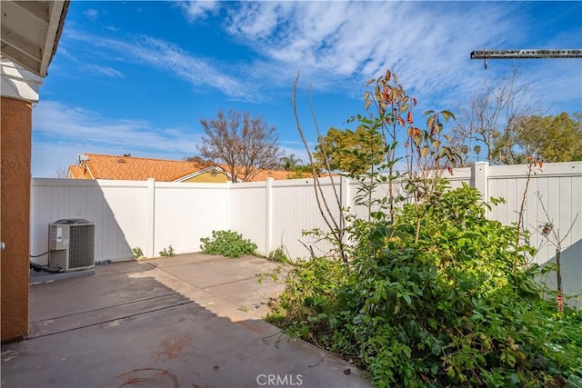 3738 Harrison St Unit 31, Riverside, CA 92503 - view of patio with central AC and a fenced backyard
