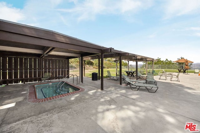 view of pool featuring a patio