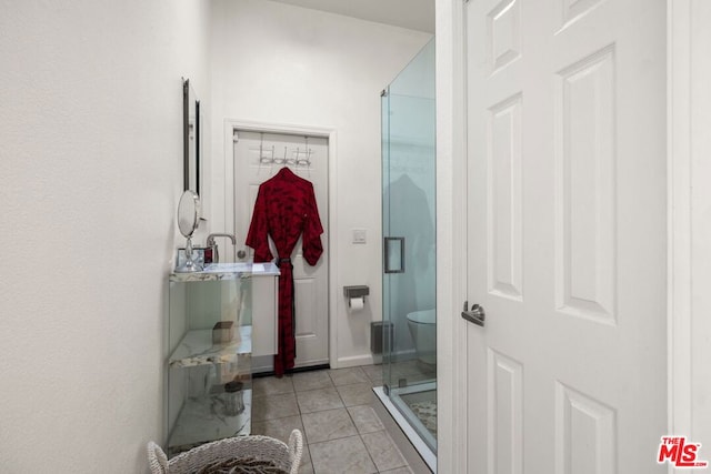 bathroom featuring tile patterned flooring