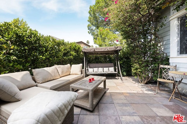 view of patio with an outdoor living space