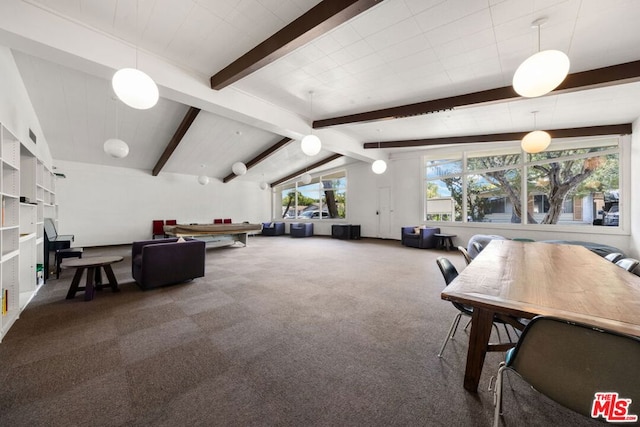 dining area with carpet floors and vaulted ceiling with beams