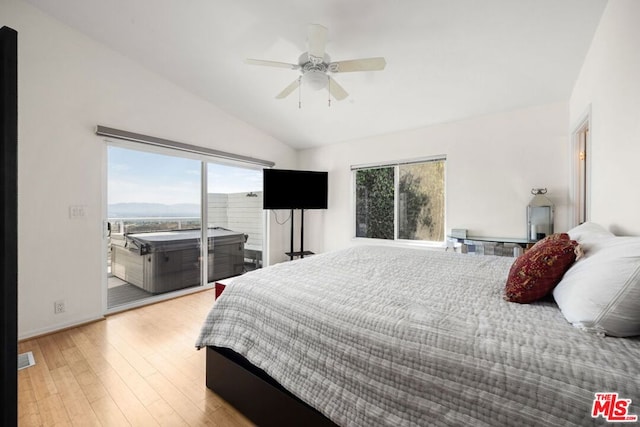 bedroom with lofted ceiling, access to exterior, ceiling fan, and light wood-type flooring