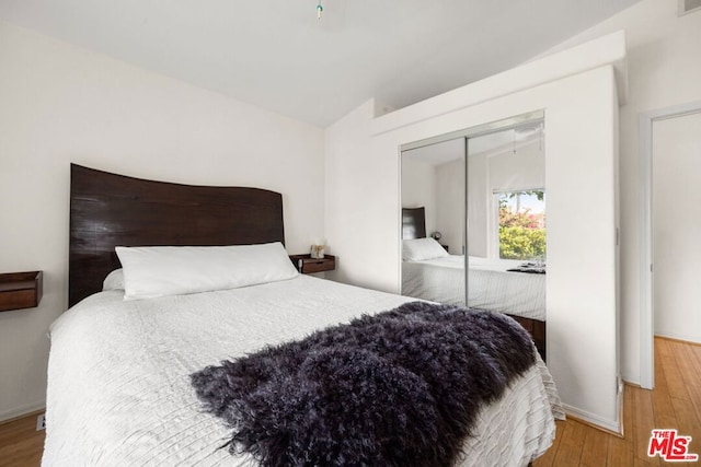 bedroom with light wood-type flooring