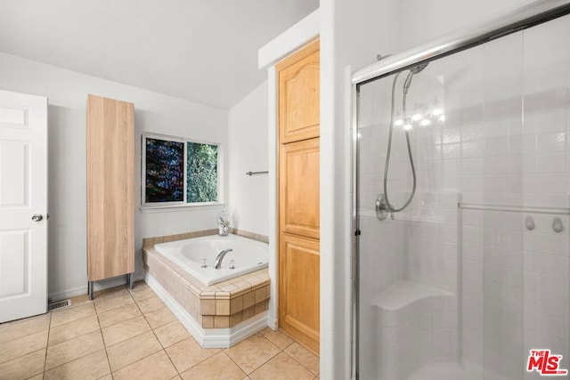 bathroom with plus walk in shower and tile patterned floors