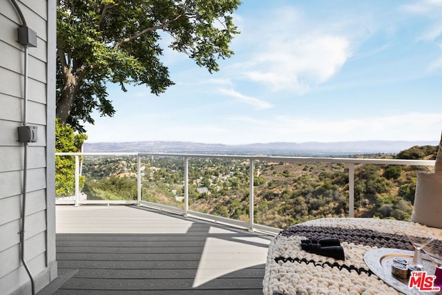 deck with a mountain view