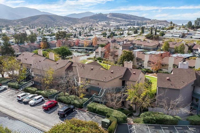 drone / aerial view featuring a mountain view