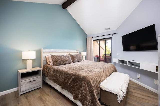 bedroom featuring beam ceiling, hardwood / wood-style flooring, access to outside, and high vaulted ceiling