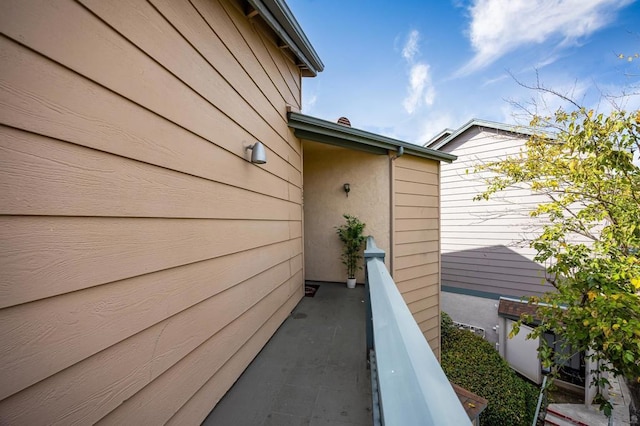 view of property exterior with a balcony