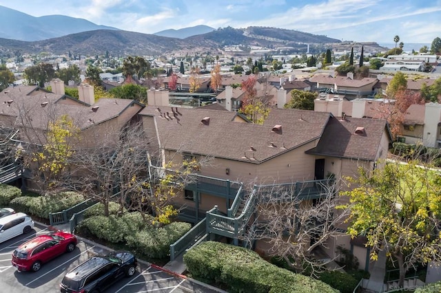 birds eye view of property with a mountain view