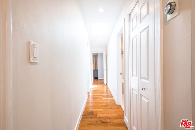 corridor featuring light wood-type flooring