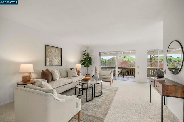 living room featuring light colored carpet