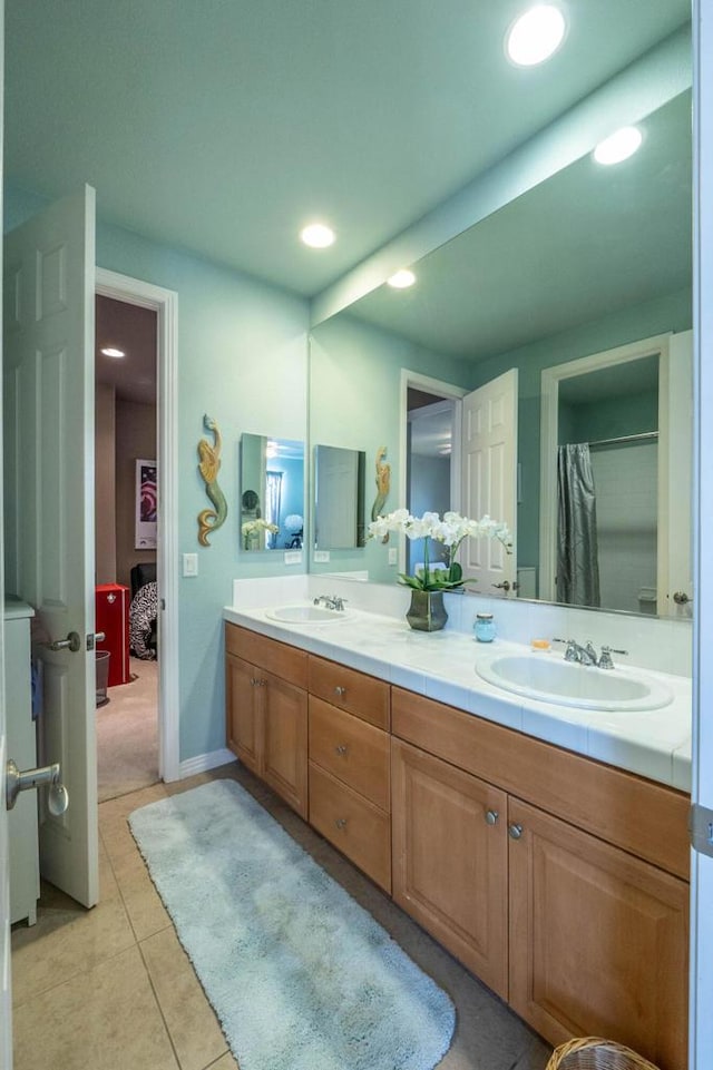 bathroom featuring vanity and tile patterned floors