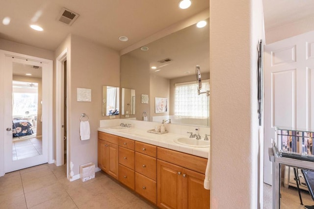 bathroom featuring vanity and tile patterned floors