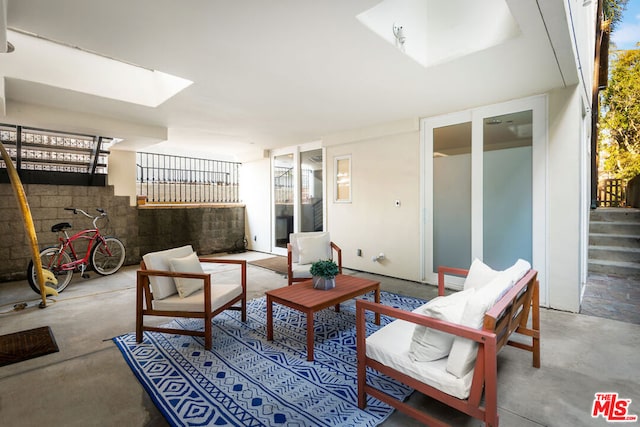 view of patio featuring an outdoor living space and a pergola