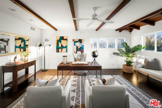 living room with hardwood / wood-style flooring, plenty of natural light, ceiling fan, and beamed ceiling