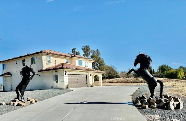 view of front of home featuring a garage