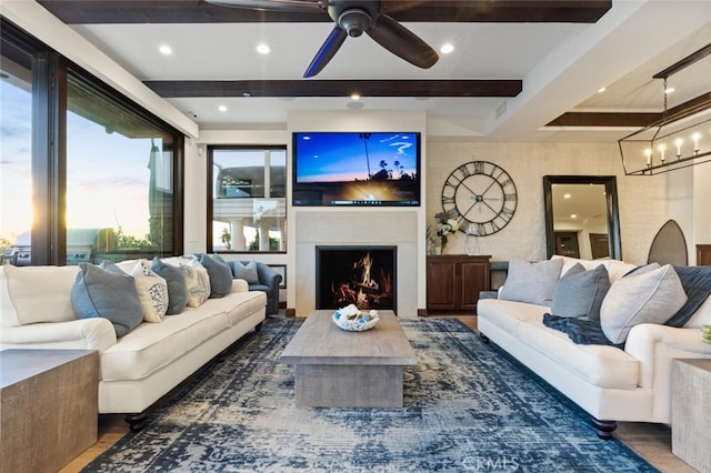 living room featuring beamed ceiling