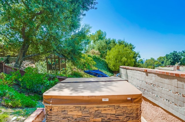 entry to storm shelter with a hot tub