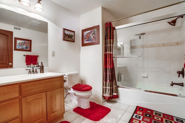 full bathroom with shower / tub combo with curtain, vanity, tile patterned floors, and toilet